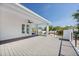 Large deck features white railing and overlooks the neighborhood at 4604 W Euclid Ave, Tampa, FL 33629
