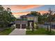 Stunning two-story home featuring manicured landscaping, two-car garage, and welcoming curb appeal at 4604 W Euclid Ave, Tampa, FL 33629