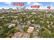 Aerial view of Tampa neighborhood featuring mature landscaping and a vibrant cityscape at 507 S Willow Ave, Tampa, FL 33606