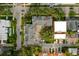 Aerial view of property highlighting neighboring residential area, pool, and landscaping at 507 S Willow Ave, Tampa, FL 33606