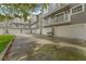 Townhome featuring multiple garages, balconies and neutral paint scheme at 507 S Willow Ave, Tampa, FL 33606