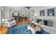 Open concept living room flows into dining area and kitchen at 507 S Willow Ave, Tampa, FL 33606
