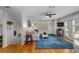 Living area with lots of natural light from windows and sliding glass door at 507 S Willow Ave, Tampa, FL 33606
