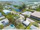 Aerial view showcasing the neighborhood with nearby canal and community amenities at 508 2Nd St, Indian Rocks Beach, FL 33785