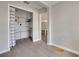The bonus room features a storage closet with shelving and an access door to another room at 508 2Nd St, Indian Rocks Beach, FL 33785