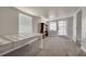 This living space features natural light from two windows and a glass door at 508 2Nd St, Indian Rocks Beach, FL 33785