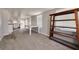 This living space features a view to the kitchen, a dining table, and a wood shelf at 508 2Nd St, Indian Rocks Beach, FL 33785