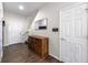Welcoming foyer with wood floors and convenient access to the upper levels at 5239 Fallen Leaf Dr, Riverview, FL 33578