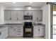 Well-equipped kitchen featuring granite countertops and stainless steel appliances at 5239 Fallen Leaf Dr, Riverview, FL 33578