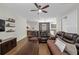 Relaxing living room with open access to the kitchen and slider door to backyard at 5239 Fallen Leaf Dr, Riverview, FL 33578