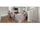 Comfortable living room featuring a large sectional sofa and hardwood flooring at 5239 Fallen Leaf Dr, Riverview, FL 33578