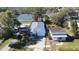 An aerial shot showcases this charming single-Gathering home with mature trees in a desirable neighborhood at 5528 40Th N St, St Petersburg, FL 33714