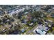 An aerial shot highlights the property's location in a well-connected neighborhood with nearby amenities at 5528 40Th N St, St Petersburg, FL 33714