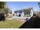 Spacious backyard with a patio, a lawn, and attractive landscaping at 5528 40Th N St, St Petersburg, FL 33714