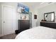 Comfortable bedroom featuring a flat screen TV, dresser, and soothing decor for a peaceful retreat at 5528 40Th N St, St Petersburg, FL 33714