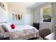 Comfortable bedroom featuring neutral tones, a window, and a modern closet at 5528 40Th N St, St Petersburg, FL 33714