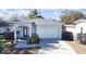 A charming single-Gathering home with a well-manicured lawn, and a two-car garage at 5528 40Th N St, St Petersburg, FL 33714