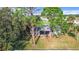 Charming single-story home with a well-maintained lawn and mature trees, nestled in a peaceful neighborhood at 5580 S Salford Blvd, North Port, FL 34287