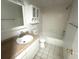 Bathroom featuring vanity, mirror, toilet, bathtub and shower at 6342 Newtown Cir # A4, Tampa, FL 33615
