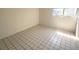 This bright bedroom offers tile flooring and ample natural light at 6342 Newtown Cir # A4, Tampa, FL 33615