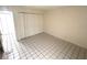 Bright bedroom with a closet and tile flooring at 6342 Newtown Cir # A4, Tampa, FL 33615