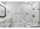Modern bathroom featuring sleek glass shower, sleek vanity, and elegant fixtures at 6605 N Nebraska Ave # 23, Tampa, FL 33604