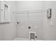 Laundry room with utility sink and ample outlets at 6605 N Nebraska Ave # 23, Tampa, FL 33604