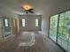 Bedroom with balcony access and a closet at 8158 Eagles Park N Dr, St Petersburg, FL 33709