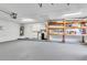 Three car garage with water heater and room for storage at 910 Kingscote Ct, Safety Harbor, FL 34695