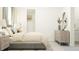Beautiful bedroom with a comfortable bed, modern dresser, and closet for optimal storage at 9509 Minnow Ray Dr, Land O Lakes, FL 34638