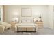Serene main bedroom with neutral tones, decorative pillows, bench, and comfortable seating at 9509 Minnow Ray Dr, Land O Lakes, FL 34638
