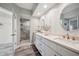 Bathroom showcasing double vanity with a quartz countertop and a glass shower at 960 Starkey Rd # 10505, Largo, FL 33771