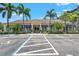 Community clubhouse with ample parking, lush landscaping, and convenient accessibility at 960 Starkey Rd # 10505, Largo, FL 33771