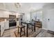 Bright kitchen with stainless steel appliances, mosaic backsplash, and modern lighting fixtures at 960 Starkey Rd # 10505, Largo, FL 33771