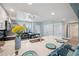 Bright kitchen with a quartz breakfast bar, stainless appliances, and modern lighting at 960 Starkey Rd # 10505, Largo, FL 33771