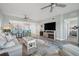 Spacious open-concept living area with modern furnishings that flow into the breakfast bar at 960 Starkey Rd # 10505, Largo, FL 33771