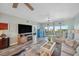 Open-concept living area with modern furnishings and large windows offering bright views at 960 Starkey Rd # 10505, Largo, FL 33771