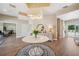 Elegant lobby area with a decorative table, a view to an exit, and an inviting atmosphere at 960 Starkey Rd # 10505, Largo, FL 33771