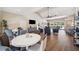Bright community lounge with a wall-mounted TV, comfortable seating, and backyard access at 960 Starkey Rd # 10505, Largo, FL 33771