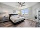 Comfortable main bedroom with a view and ceiling fan at 960 Starkey Rd # 10505, Largo, FL 33771