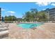 Inviting community pool area with comfortable lounge chairs for relaxation and leisure at 960 Starkey Rd # 10505, Largo, FL 33771