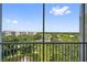 Beautiful view from the screened in balcony of the building, green golf course, and pond at 960 Starkey Rd # 10505, Largo, FL 33771