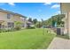 Expansive backyard with lush lawn and patio area, ideal for outdoor activities and relaxation in a private setting at 9907 Carlsdale Dr, Riverview, FL 33578