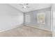 Spacious bedroom features plush carpet, natural light, and neutral walls at 9907 Carlsdale Dr, Riverview, FL 33578
