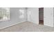 Bedroom with carpet, natural light, and door leading to the closet at 9907 Carlsdale Dr, Riverview, FL 33578