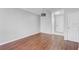 Clean, bright dining room with modern light fixture, neutral paint, and hardwood floors at 9907 Carlsdale Dr, Riverview, FL 33578