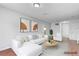 Comfortable living room with modern decor, neutral paint and hardwood floors at 9907 Carlsdale Dr, Riverview, FL 33578
