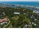 Extensive acreage on the water with mature landscaping and a large barn at 10930 Spring St, Largo, FL 33774