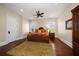 Cozy bedroom with hardwood floors, neutral walls, and comfortable furnishings, creating a relaxing retreat at 10930 Spring St, Largo, FL 33774
