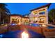 Luxury home features a fire feature and outdoor entertaining area at 10930 Spring St, Largo, FL 33774